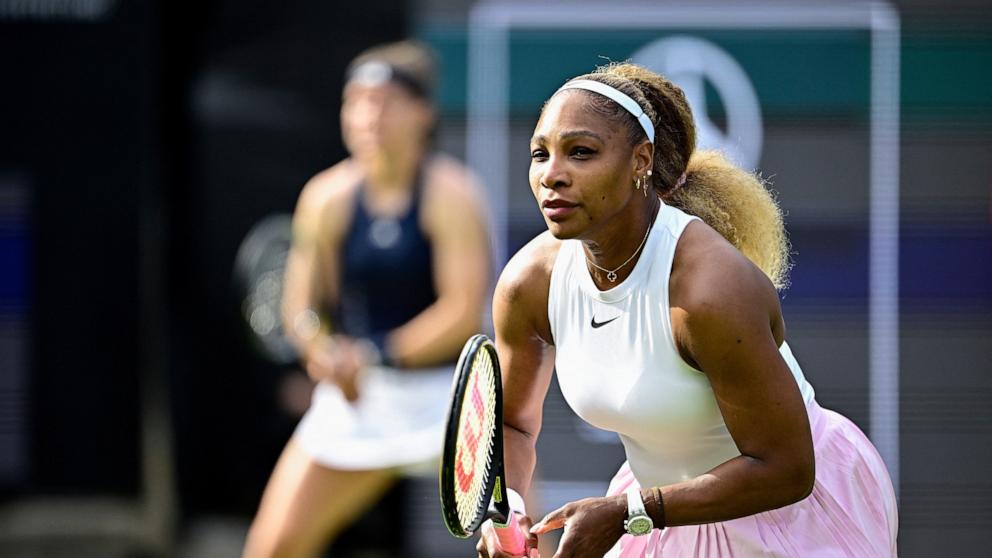PHOTO: US tennis player Serena Williams (R) and Czech Republic's Karolina Muchova play against New Zealand's Erin Routliffe and Mexico's Giuliana Olmos during the women's doubles round of 16 match at the WTA500 Berlin Tennis Open tournament in Berlin.