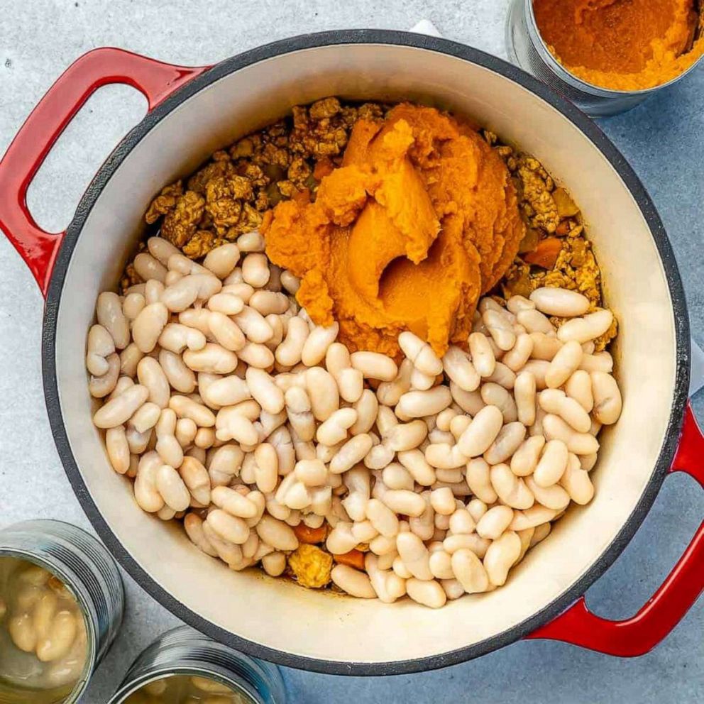 PHOTO: Ingredients to make pumpkin white bean chili in a pot. 