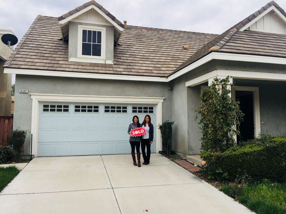 PHOTO: Yesenia Cedillo and Jessica Cedillo pose in front of their home.