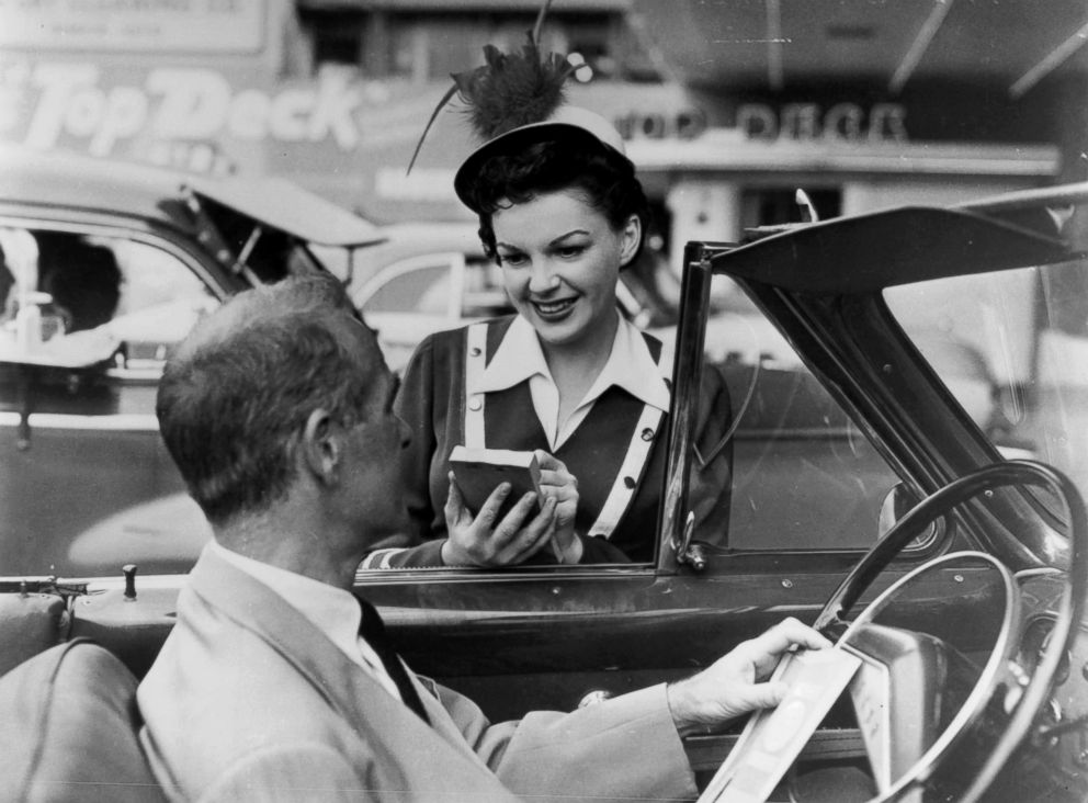 PHOTO: Judy Garland takes a food order from a man in a scene from the 1954 film "A Star Is Born."