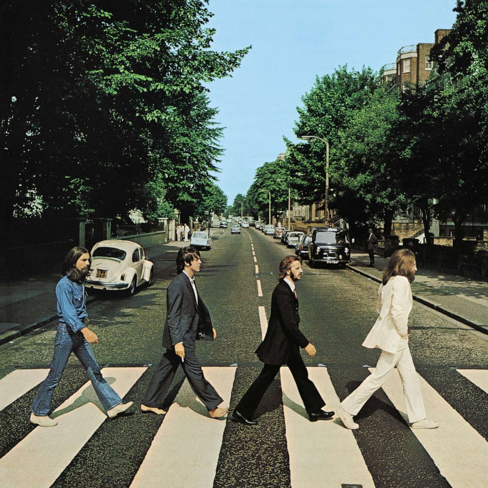 PHOTO: Members of the Beatles, George Harrison, Paul McCartney, Ringo Starr, John Lennon, cross Abbey Road in London, August 8, 1969.