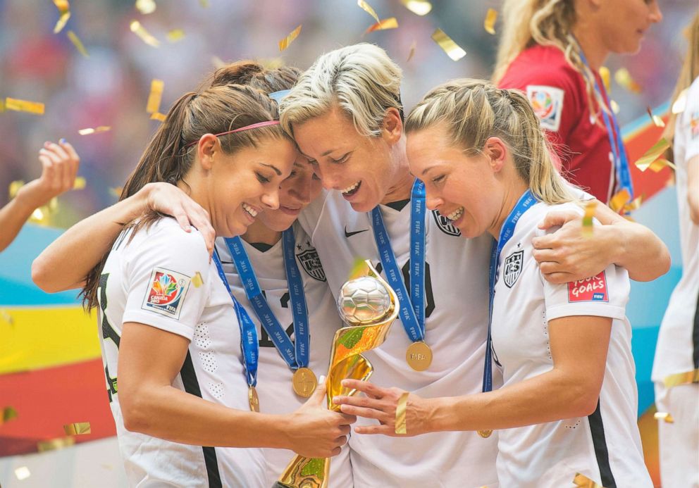 PHOTO: Alex Morgan (left), Lauren Holiday, Abby Wambach, and Whitney Engen of Team USA celebrate their victory at the 2015 women's World Cup Soccer in Vancouver, July 5, 2015. 