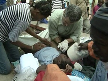 VIDEO: Dr. Richard Besser helps a woman give birth amid the chaos in Haiti.