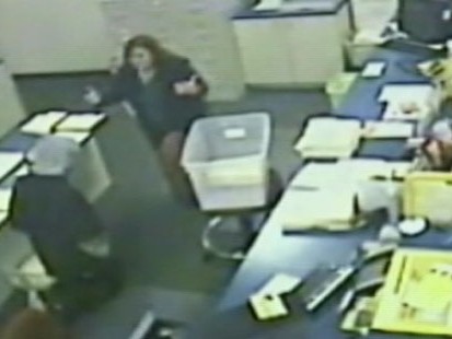 VIDEO: Alleged armed robber hands bullet to store clerk after she prays with him.