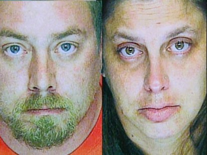 A picture of the accused Girl Scout leader and her husband.