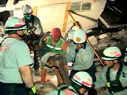 VIDEO: Search and rescue teams frantically work to pull survivors from rubble.