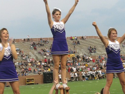 Varsity cheerleaders face misdemeanor hazing charges in a criminal case.