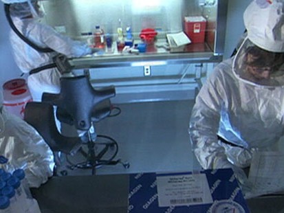 VIDEO: Hundreds of volunteers line up for a dose of the H1N1 trial vaccine.