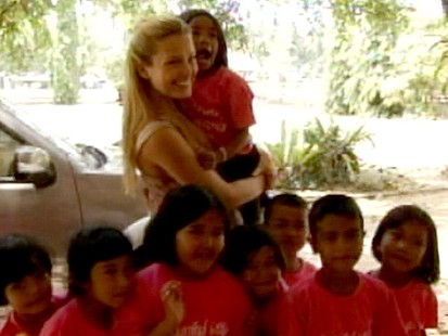 VIDEO: After surviving the 2004 tsunami, the model helps others with Happy Hearts.