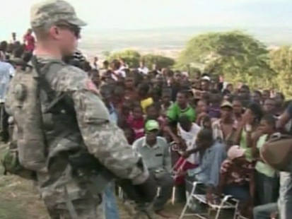 VIDEO: U.S. troops keep order on the ground so that aid can be distributed.