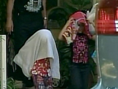 VIDEO: Two of the octuplets walking to a car.