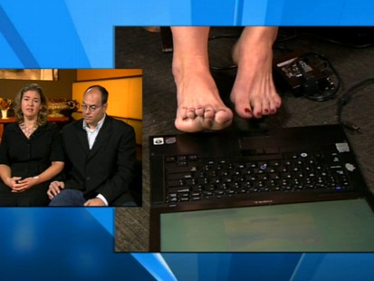 VIDEO: Woman tied to her bed by a burglar used her toes to type a message for help.