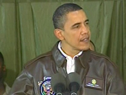 VIDEO: Obama presses President Karzai on corruption and rallies American troops.