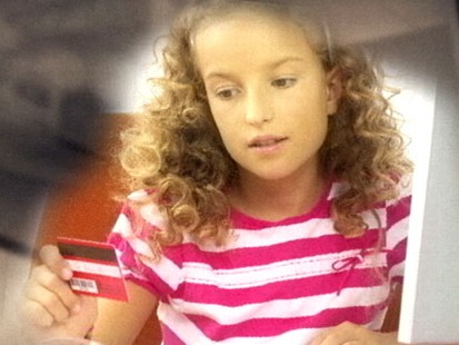 VIDEO: Parents debate the appropriate age to give their children credit cards.