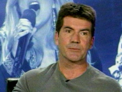VIDEO: Simon Cowell focuses critical eye on himself as he nears his 50th birthday.