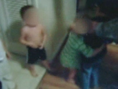 A picture of toddlers fighting.