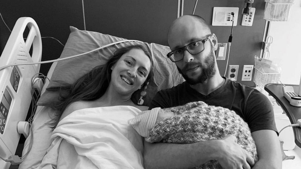 PHOTO: Deborah and Lee Dorbert hold their newborn son Milo on March 3, 2023, shortly before he died due to Potter syndrome.