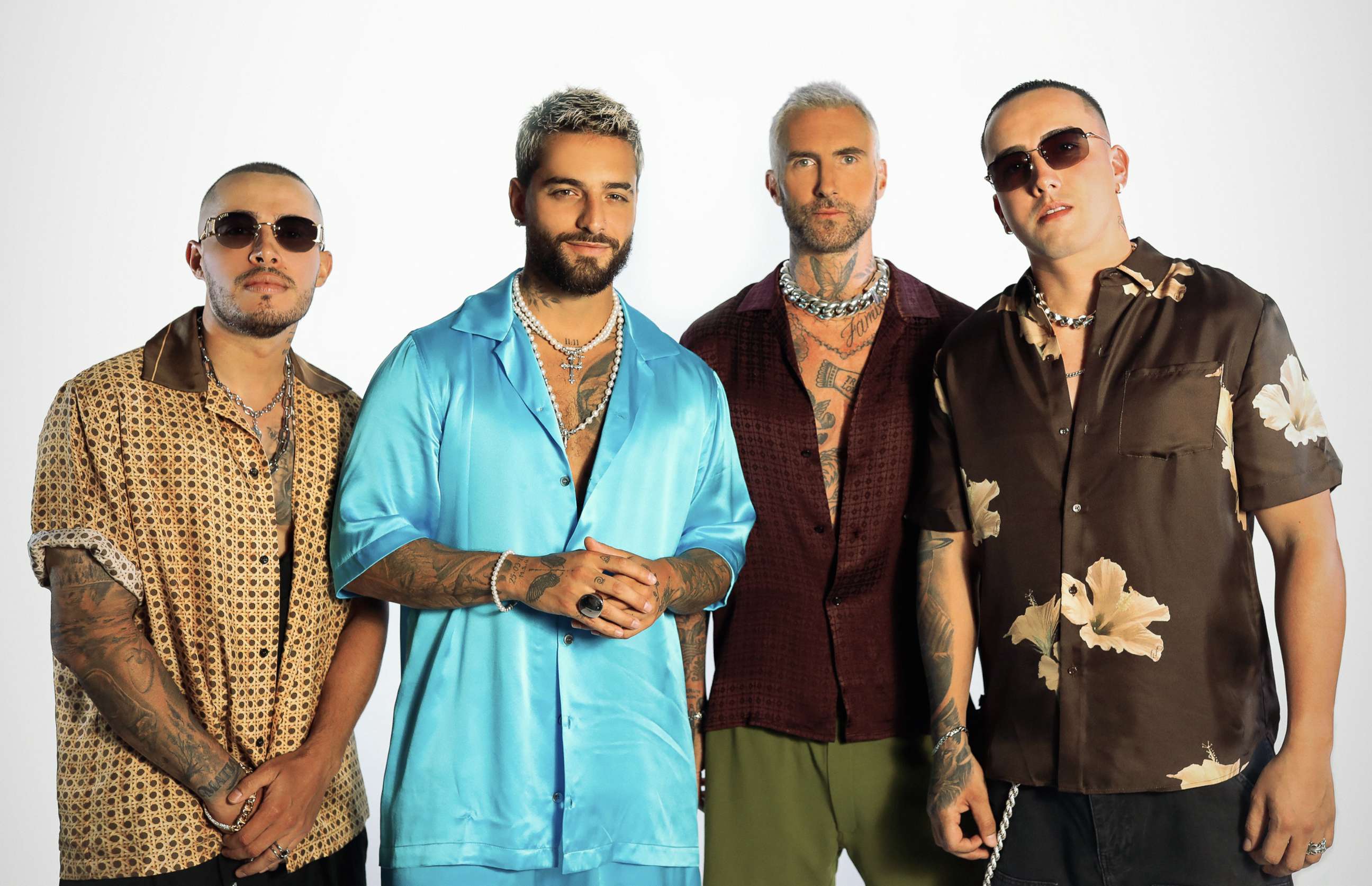 PHOTO: Record producers, The Rudeboyz, pose with singers Adam Levine and Maluma ahead of the release of the single "Ojala."