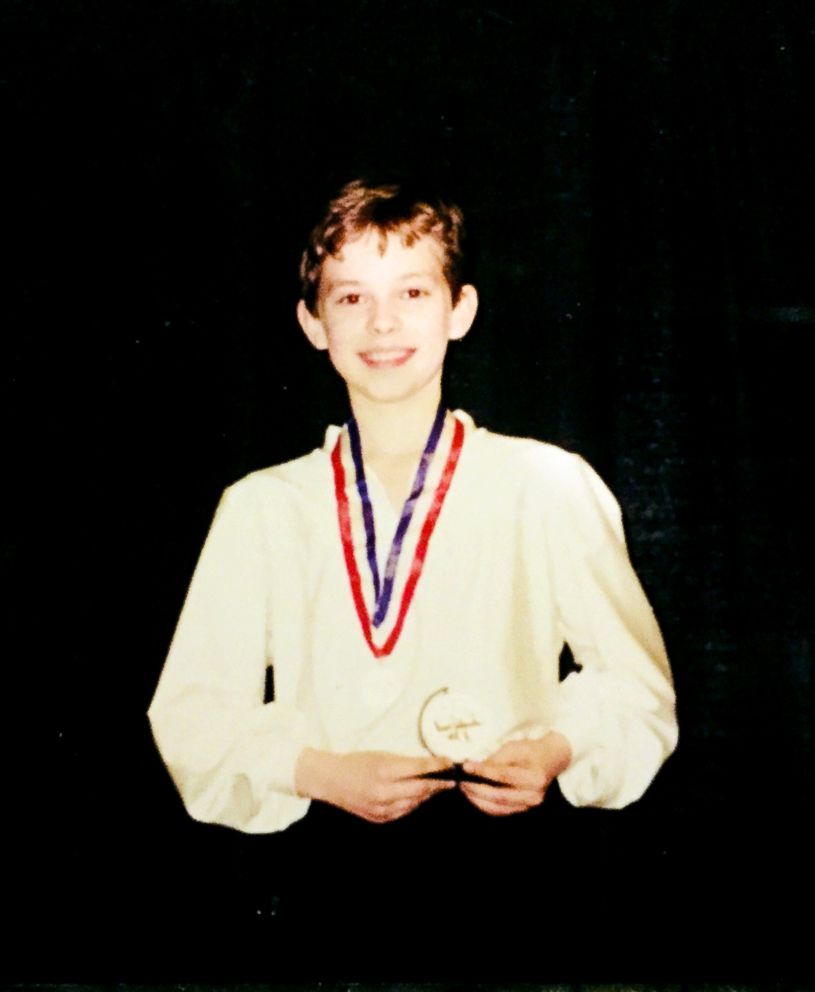 PHOTO: Adam Rippon shows off a medal from one of his first ice skating competitions.