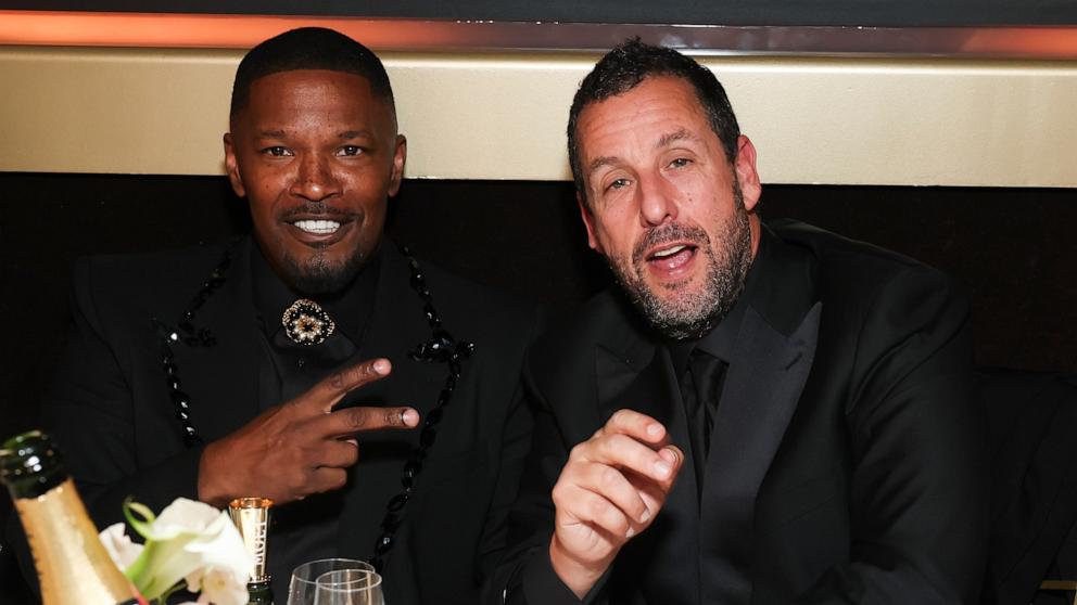 PHOTO: Jamie Foxx and Adam Sandler attend the 82nd Annual Golden Globe Awards, Jan. 5, 2025, in Beverly Hills, Calif.