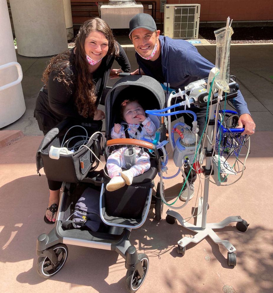 PHOTO: Parents Aliesha and Chris Smith took a photo with Addy during her first outing outside Rady Children's Hospital in San Diego.