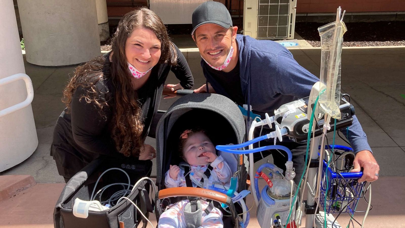 PHOTO: Parents Aliesha and Chris Smith took a photo with Addy during her first outing outside Rady Children's Hospital in San Diego.