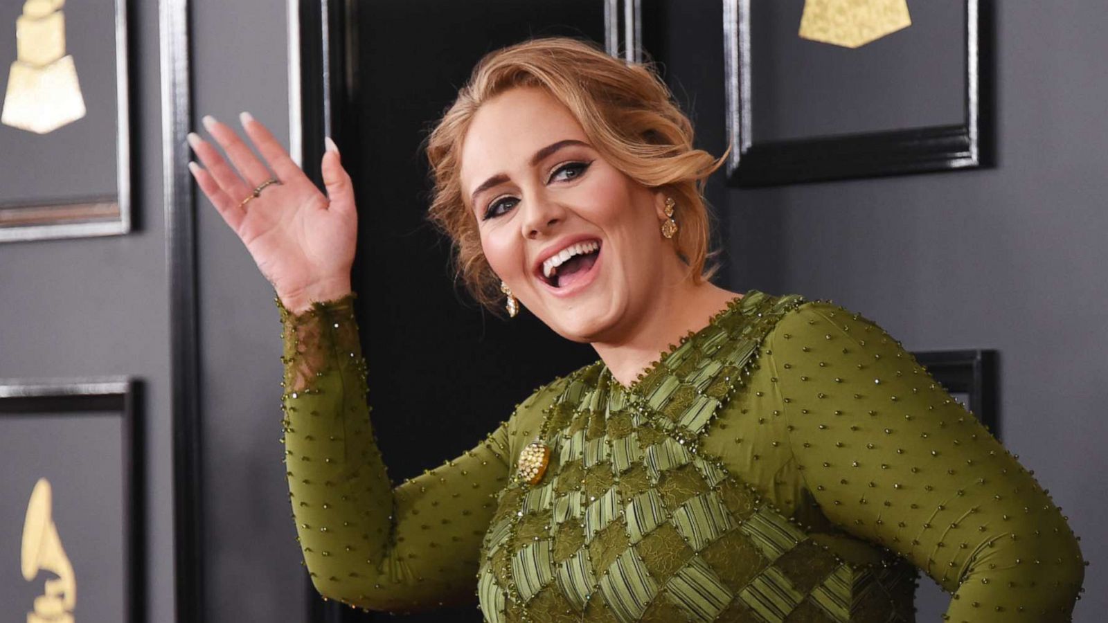 PHOTO: Adele waves on the red carpet at the 59th Annual Grammy Awards at the Staples Center in Los Angeles, Feb. 12, 2017.