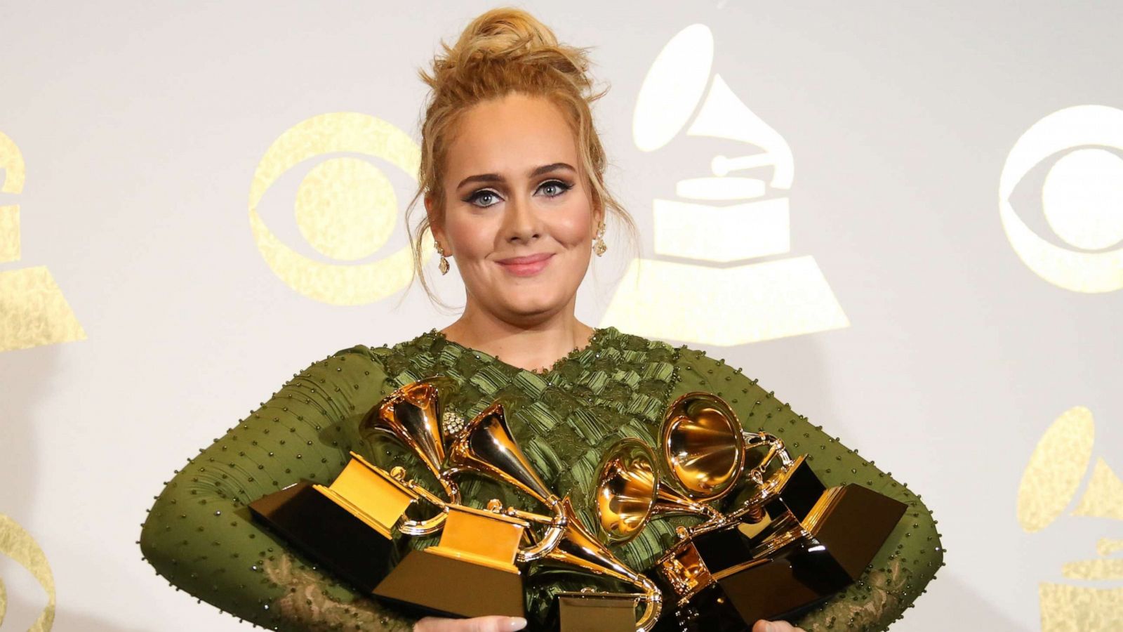 PHOTO: Singer Adele poses in the press room with her awards at The 59th GRAMMY Awards at Staples Center on Feb. 12, 2017 in Los Angeles.