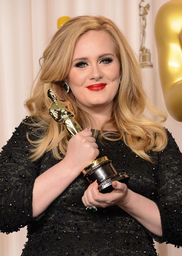 PHOTO: Adele, winner of the Best Original Song award for 'Skyfall,' poses in the press room during the Oscars, Feb. 24, 2013, in Hollywood, Calif.  
