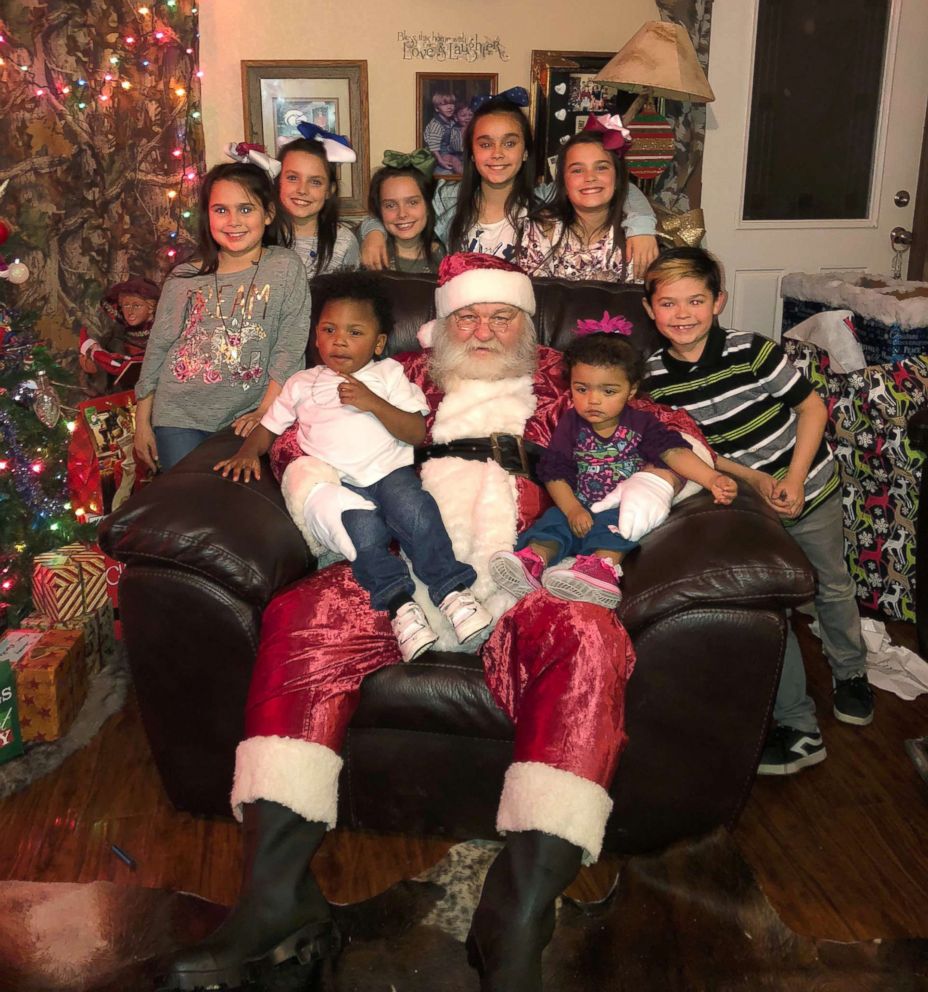 PHOTO: Eight of the 13 Hawthorn siblings pose in an undated photo with Santa Claus.