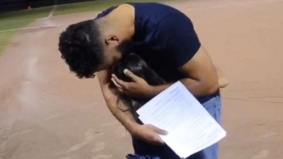 PHOTO: Leonardo Avila stood on a baseball field as his daughter, Alessandra Avila, 8, asked him to adopt her in September.