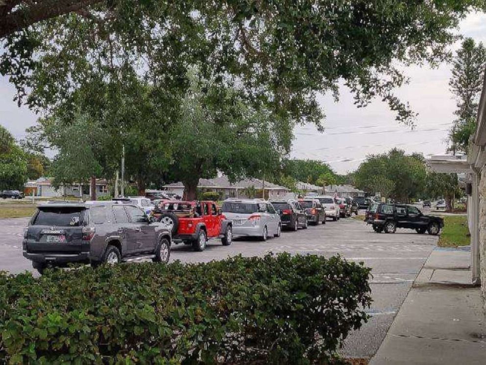 PHOTO: Cars lined the streets April 18 in Bradenton, Florida, for 3-year-old Reney just days after her parents Lynndsey and Jameson Wilson signed adoption papers. The family had to cancel Reney's original adoption party because of COVID-19.