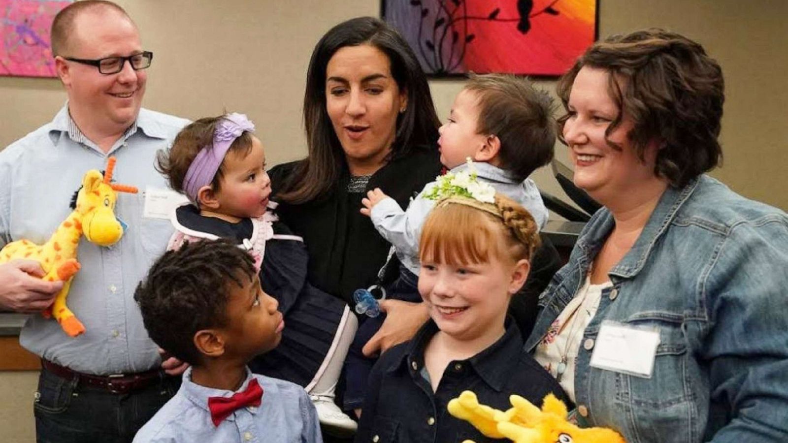 PHOTO: The Hall family poses with Judge Shereen Askalani for a photo after adopting 15-month-old twins Charlotte and Titus on Nov. 23, 2019, in Minn.