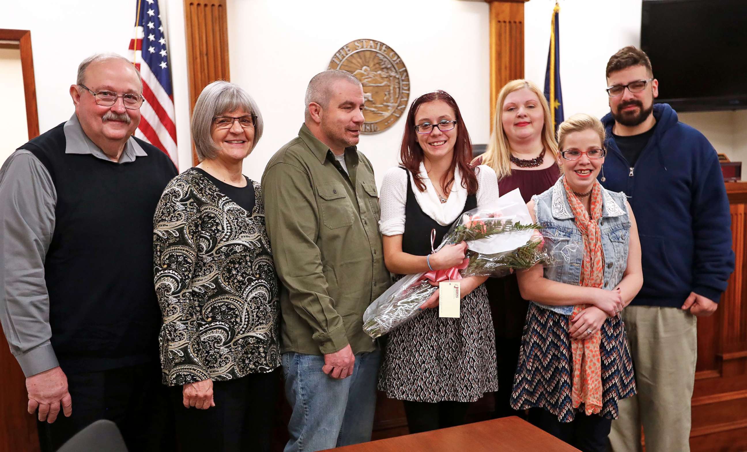 PHOTO: Scarlet poses with her family on her adoption day at the Grant County Courthouse in Marion, Ind., Nov. 16, 2018. 