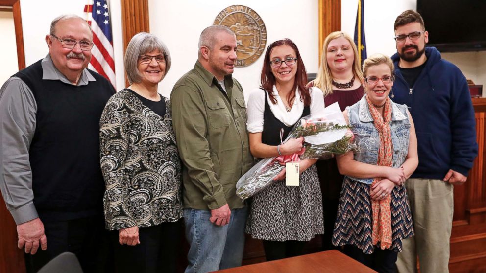 PHOTO: Scarlet poses with her family on her adoption day at the Grant County Courthouse in Marion, Ind., Nov. 16, 2018. 