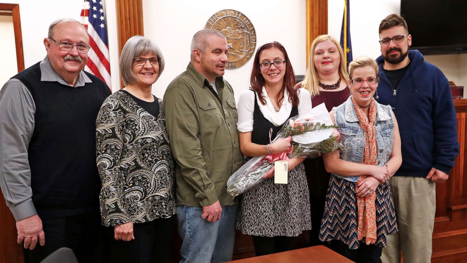 PHOTO: Scarlet poses with her family on her adoption day at the Grant County Courthouse in Marion, Ind., Nov. 16, 2018.