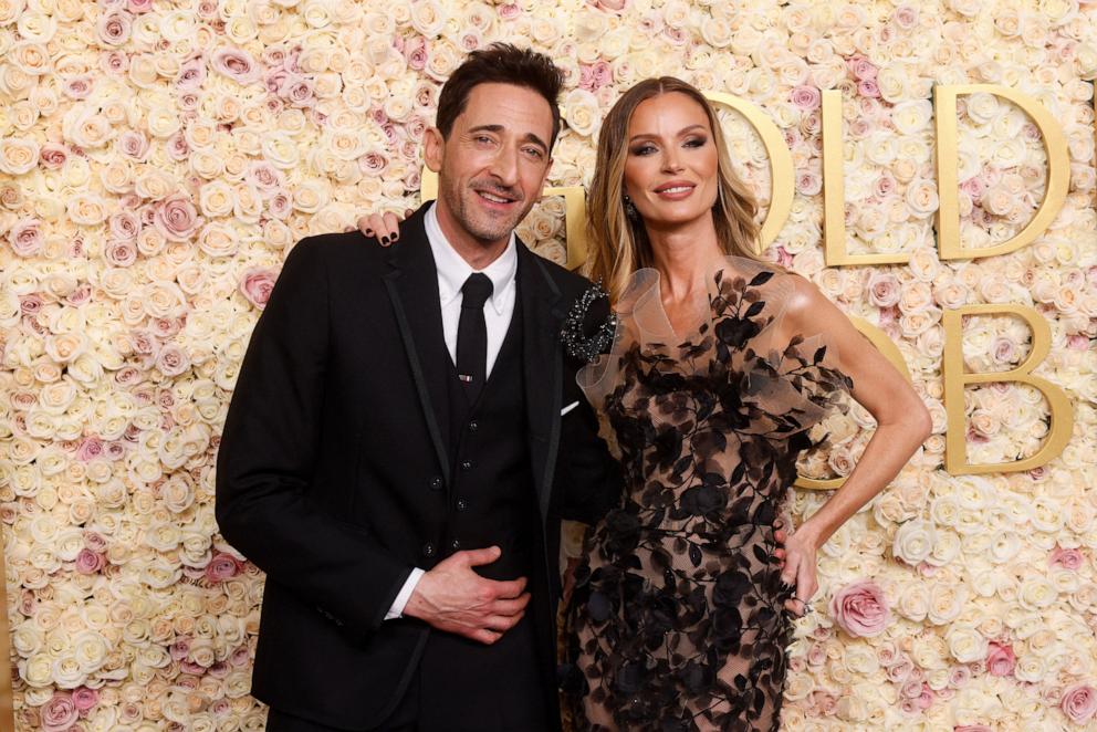 PHOTO: Adrien Brody and Georgina Chapman arrive for the 82nd annual Golden Globe Awards at the Beverly Hilton hotel in Beverly Hills, California, on January 5, 2025.