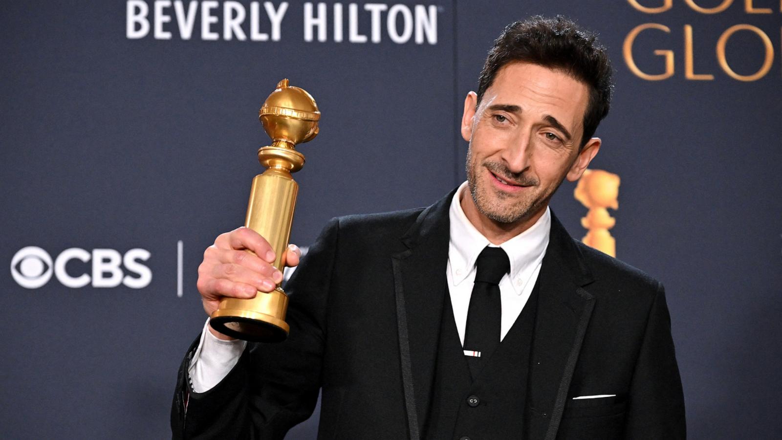 PHOTO: Adrien Brody poses with the Best Performance by a Male Actor in a Motion Picture Drama award for "The Brutalist" at the 82nd Annual Golden Globe Awards, Jan. 5, 2025, in Beverly Hills, Calif.