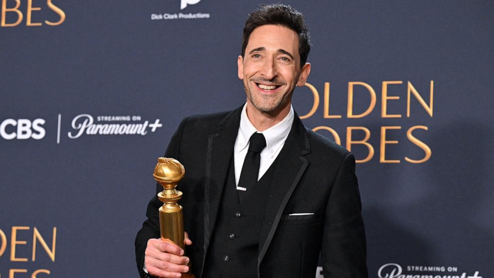 PHOTO: Adrien Brody poses with the Best Performance by a Male Actor in a Motion Picture Drama  award for "The Brutalist" at the 82nd Annual Golden Globe Awards, Jan. 5, 2025, in Beverly Hills, Calif.