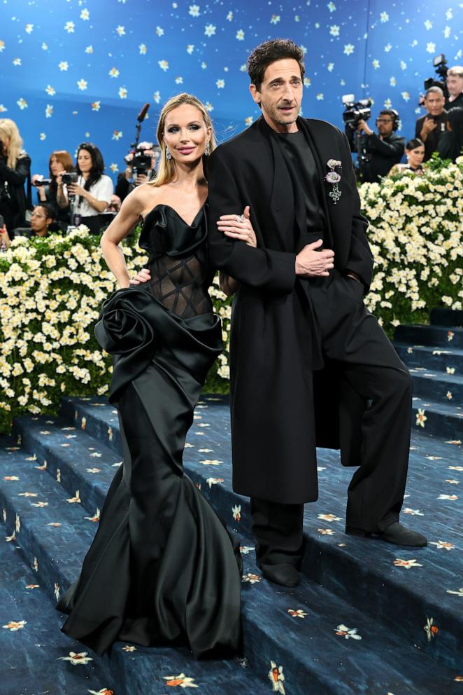 PHOTO: Georgina Chapman and Adrien Brody attend the 2025 Met Gala Celebrating "Superfine: Tailoring Black Style" at Metropolitan Museum of Art on May 05, 2025 in New York City.