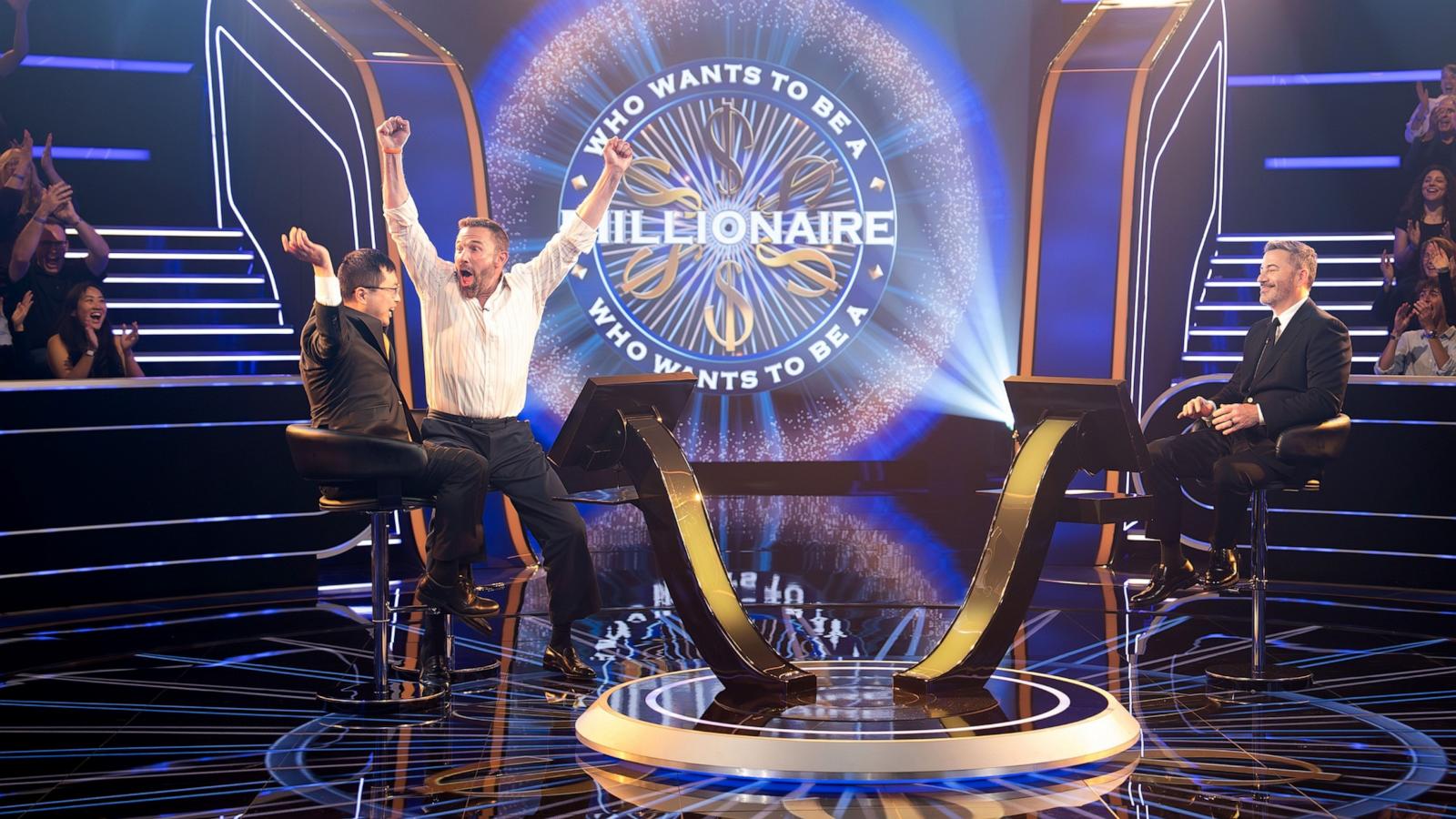 PHOTO: Jamie Ding and Ben Affleck celebrate winning a million dollars on "Who Wants To Be a Millionaire."