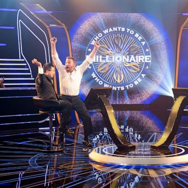 PHOTO: Jamie Ding and Ben Affleck celebrate winning a million dollars on "Who Wants To Be a Millionaire."