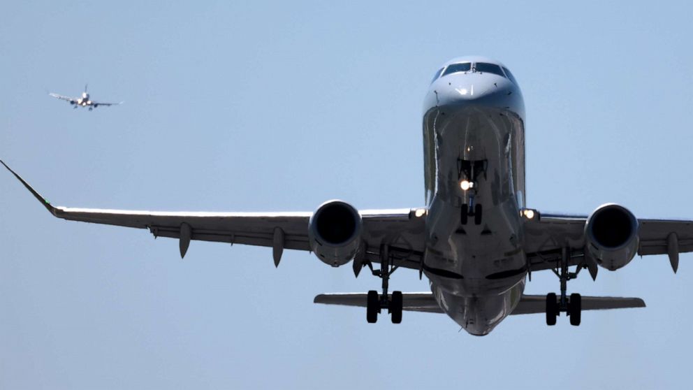 PHOTO: A flight departs from Reagan National Airport as another waits to land, Sept. 01, 2023 in Arlington, Virginia.