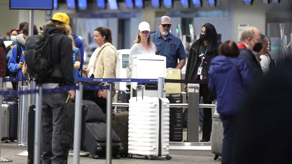 PHOTO: Passengers check in for flights at San Francisco International Airport, April 19, 2022, in San Francisco.