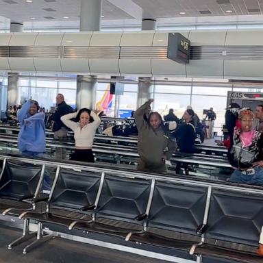 PHOTO: Members of the Hip Hop Nutcracker traveling show dance along a moving walkway at an airport in a viral TikTok video.