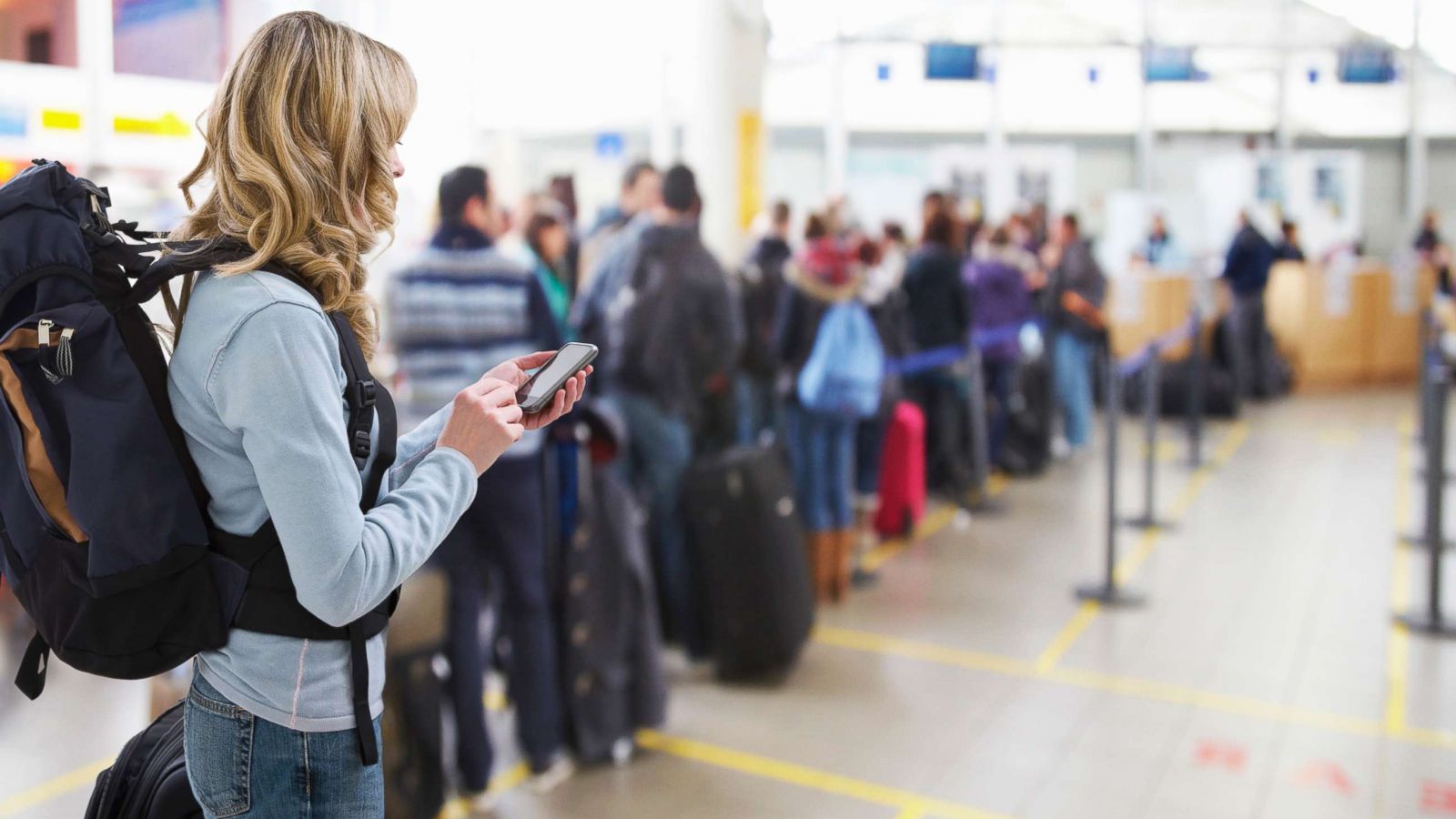 PHOTO: Travelers are pictured at an airport in this undated stock photo.