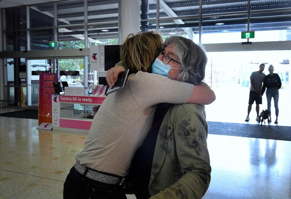 PHOTO: NiKki Brown greets her mum, Liz McColl, at Sydney Airport, October 19, 2020.