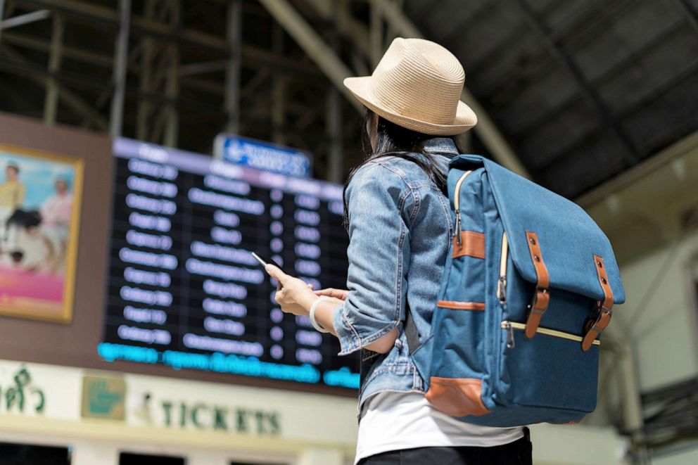 PHOTO: Stock photo of a traveler in an airport.