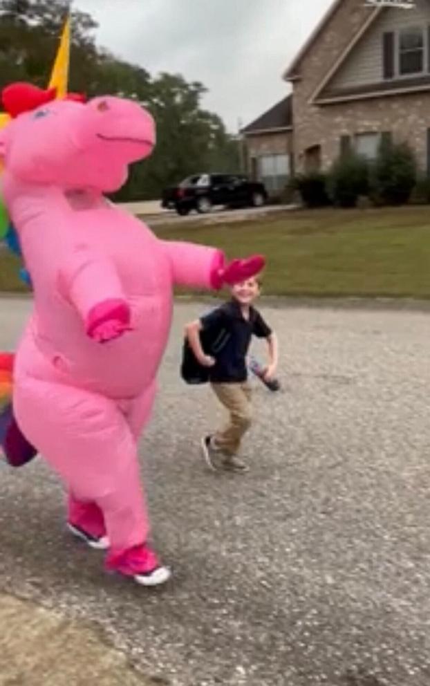 PHOTO: Alabama mom's best friend surprised her 9-year-old son dressing as a Unicorn at a bus stop.