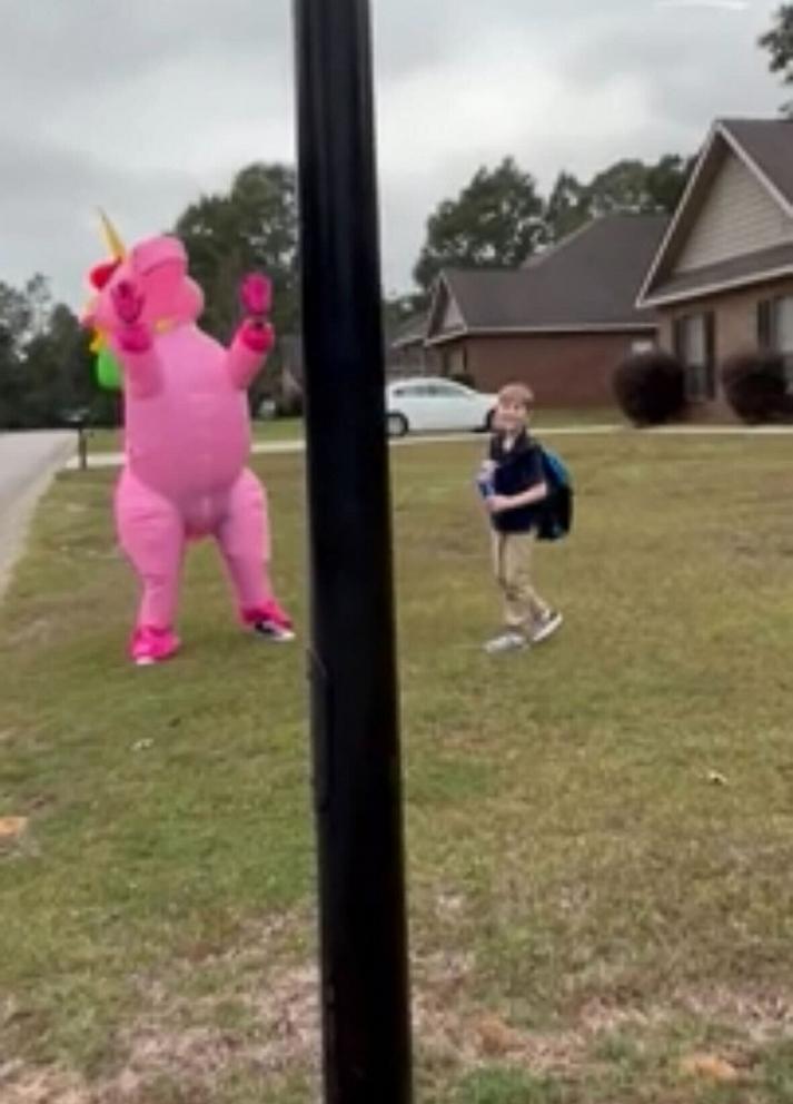 PHOTO: Alabama mom's best friend surprised her 9-year-old son dressing as a Unicorn at a bus stop.